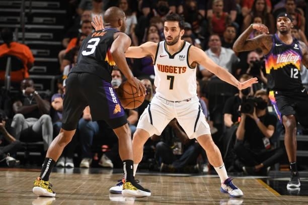 Facundo Campazzo of the Denver Nuggets plays defense on Chris Paul of the Phoenix Suns during Round 2, Game 1 of the 2021 NBA Playoffs on June 7,...