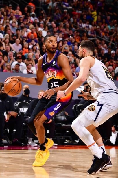 Austin Rivers of the Denver Nuggets plays defense on Mikal Bridges of the Phoenix Suns during Round 2, Game 1 of the 2021 NBA Playoffs on June 7,...