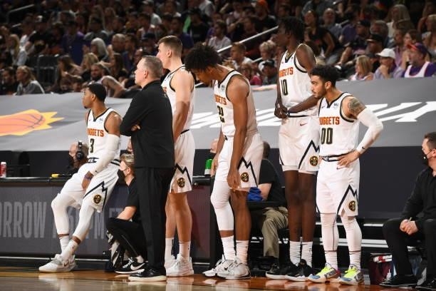 The Denver Nuggets look on during Round 2, Game 1 of the 2021 NBA Playoffs on June 7, 2021 at Phoenix Suns Arena in Phoenix, Arizona. NOTE TO USER:...