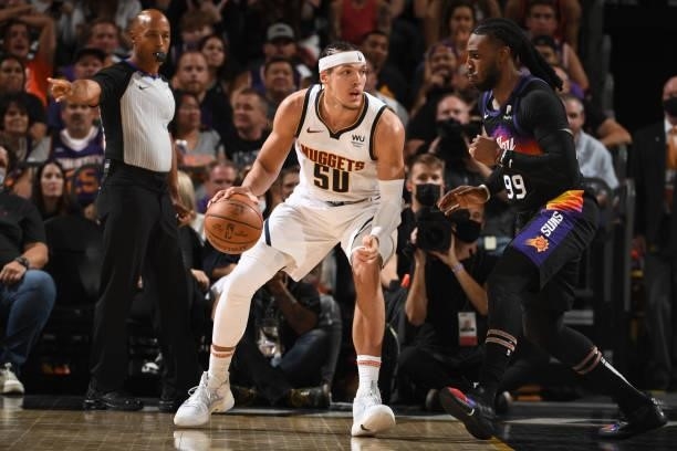 Jae Crowder of the Phoenix Suns plays defense on Aaron Gordon of the Denver Nuggets during Round 2, Game 1 of the 2021 NBA Playoffs on June 7, 2021...