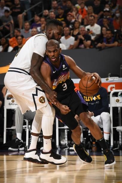 Chris Paul of the Phoenix Suns drives to the basket during Round 2, Game 1 of the 2021 NBA Playoffs on June 7, 2021 at Phoenix Suns Arena in Phoenix,...