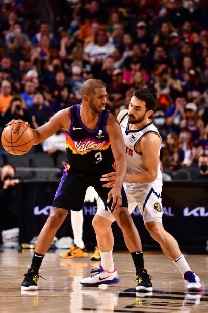 Facundo Campazzo of the Denver Nuggets plays defense on Chris Paul of the Phoenix Suns during Round 2, Game 1 of the 2021 NBA Playoffs on June 7,...