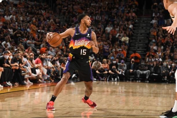 Cameron Payne of the Phoenix Suns dribbles the ball during Round 2, Game 1 of the 2021 NBA Playoffs on June 7, 2021 at Phoenix Suns Arena in Phoenix,...
