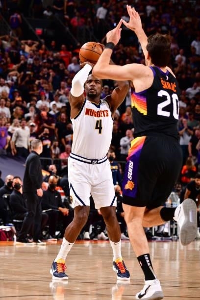 Paul Millsap of the Denver Nuggets shoots a three point basket against the Phoenix Suns during Round 2, Game 1 of the 2021 NBA Playoffs on June 7,...