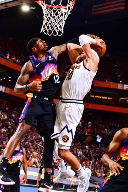 Torrey Craig of the Phoenix Suns blocks the shot against the Denver Nuggets during Round 2, Game 1 of the 2021 NBA Playoffs on June 7, 2021 at...