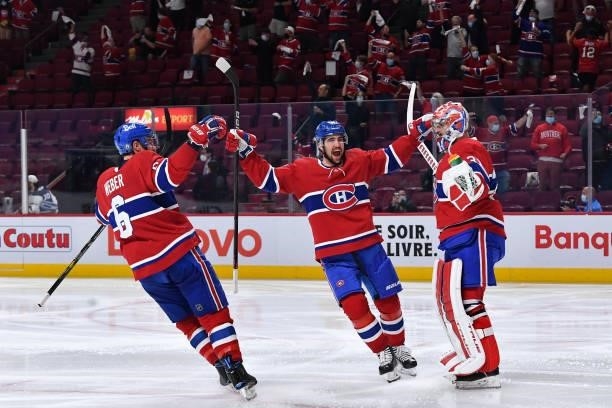 June 7: Shea Weber, Erik Gustafsson and Carey Price of the Montreal Canadiens celebrate after defeating the Winnipeg Jets in Game Four of the Second...