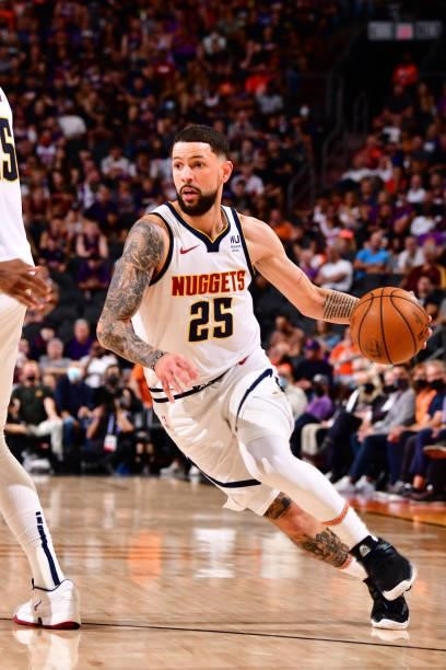 Austin Rivers of the Denver Nuggets drives to the basket against the Phoenix Suns during Round 2, Game 1 of the 2021 NBA Playoffs on June 7, 2021 at...