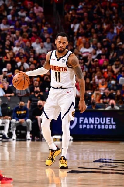 Monte Morris of the Denver Nuggets dribbles the ball against the Phoenix Suns during Round 2, Game 1 of the 2021 NBA Playoffs on June 7, 2021 at...