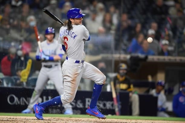 Jake Marisnick of the Chicago Cubs hits an RBI single during the fourth inning of a baseball game against the San Diego Padres at Petco Park on June...