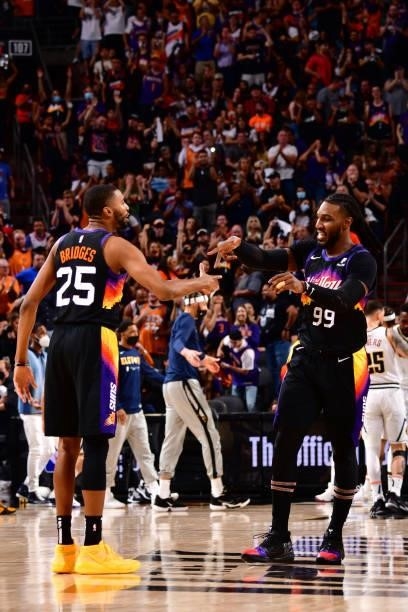 Mikal Bridges and Jae Crowder of the Phoenix Suns celebrate against the Denver Nuggets during Round 2, Game 1 of the 2021 NBA Playoffs on June 7,...