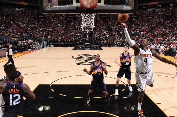 Paul Millsap of the Denver Nuggets shoots the ball against the Phoenix Suns during Round 2, Game 1 of the 2021 NBA Playoffs on June 7, 2021 at...