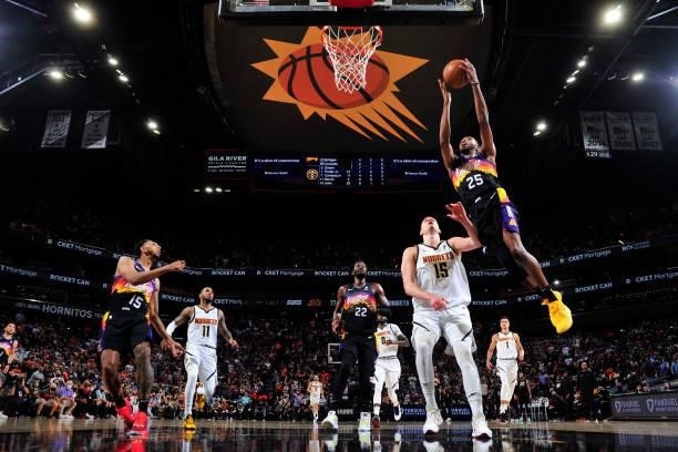 Mikal Bridges of the Phoenix Suns drives to the basket against the Denver Nuggets during Round 2, Game 1 of the 2021 NBA Playoffs on June 7, 2021 at...