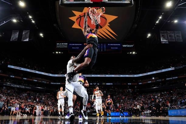 Torrey Craig of the Phoenix Suns dunks the ball against the Denver Nuggets during Round 2, Game 1 of the 2021 NBA Playoffs on June 7, 2021 at Phoenix...