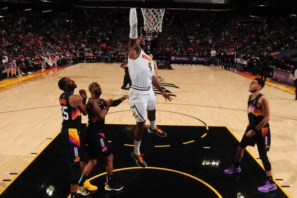 Paul Millsap of the Denver Nuggets drives to the basket against the Phoenix Suns during Round 2, Game 1 of the 2021 NBA Playoffs on June 7, 2021 at...