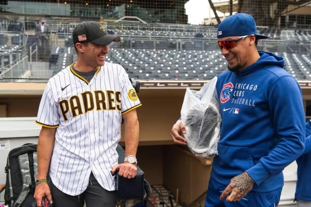 Former Saints quarterback Drew Brees meets with Javier Baez of the Chicago Cubs before facing the San Diego Padres at Petco Park on June 7, 2021 in...