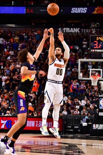 Markus Howard of the Denver Nuggets shoots a three point basket against the Phoenix Suns during Round 2, Game 1 of the 2021 NBA Playoffs on June 7,...