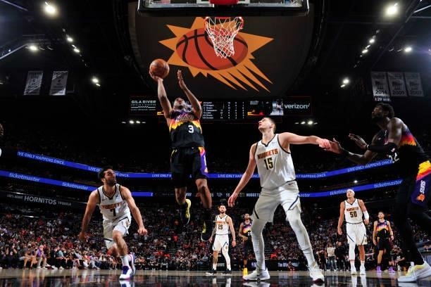 Chris Paul of the Phoenix Suns drives to the basket against the Denver Nuggets during Round 2, Game 1 of the 2021 NBA Playoffs on June 7, 2021 at...