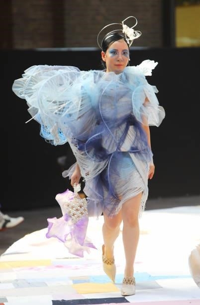 Model walks the runway at the Central Saint Martins BA Fashion Show 2021 in Granary Square on June 8, 2021 in London, England.