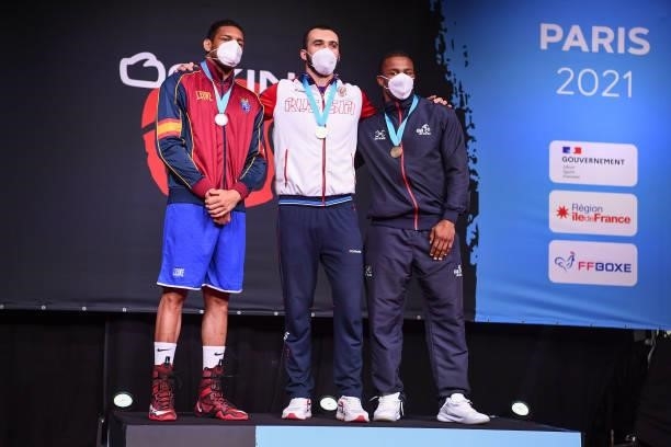 Muslim Gadzhimagomedov of Russia, Emmanuel REYES and Cheavon Clarke of Great Britain during the boxing tournament qualifiers for the Tokyo Olympics...