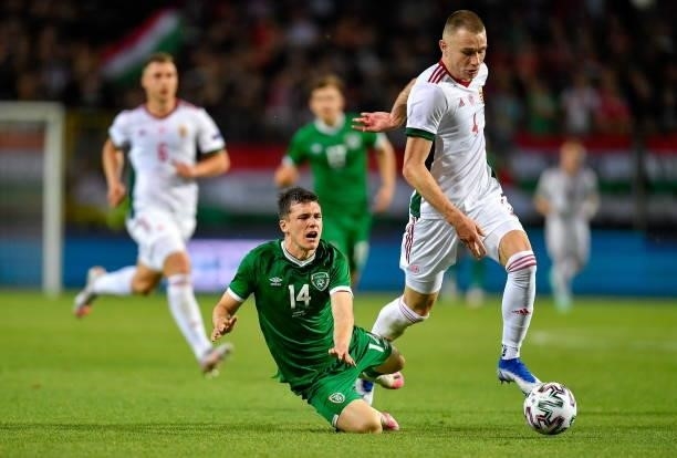 Budapest , Hungary - 8 June 2021; Attila Szalai of Hungary in action against Jason Knight of Republic of Ireland during the international friendly...