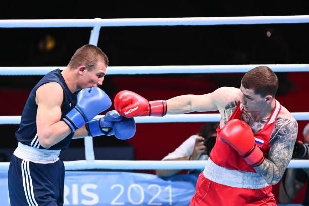 Bakshi GLEB of Russia and Oleksandr KHYZHNIAK of Ukraine during the boxing tournament qualifiers for the Tokyo Olympics at Grand Dome on June 8, 2021...
