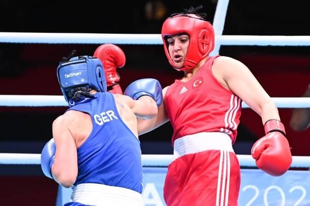 Busenaz SURMENELI of Turkey and Nadine APETZ of Germany during the boxing tournament qualifiers for the Tokyo Olympics at Grand Dome on June 8, 2021...