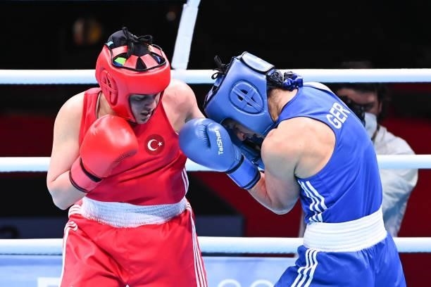 Busenaz SURMENELI of Turkey and Nadine APETZ of Germany during the boxing tournament qualifiers for the Tokyo Olympics at Grand Dome on June 8, 2021...