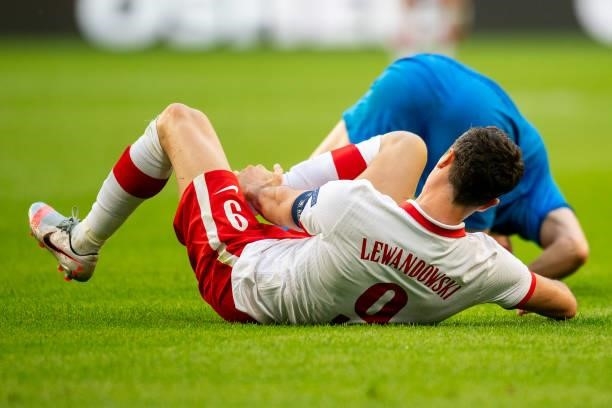 Robtert Lewandowski of Poland injured during the international friendly match between Poland and Iceland at Stadion Miejski on June 8, 2021 in...