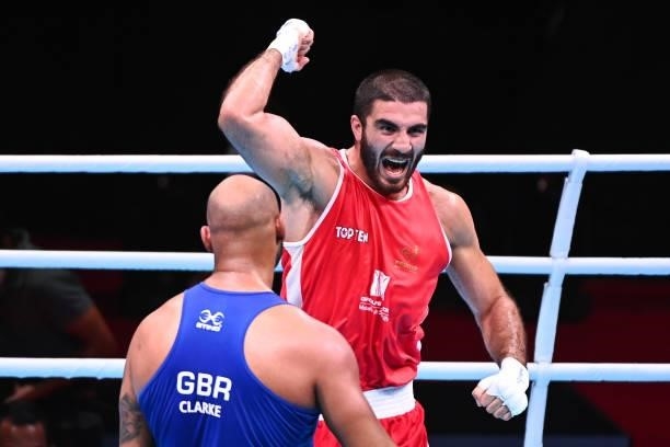 Aliev MOURAD of France celebrates and Frazer CLARKE of Great Britain during the boxing tournament qualifiers for the Tokyo Olympics at Grand Dome on...