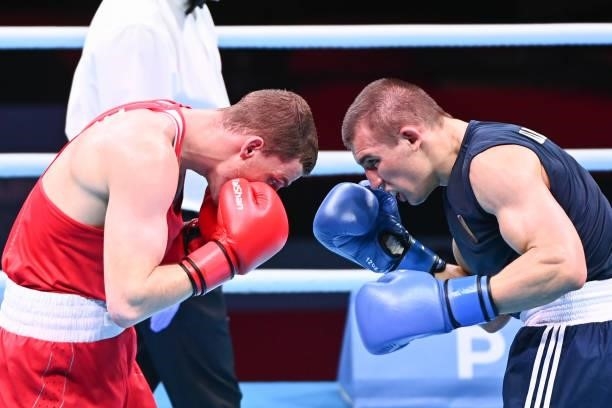 Bakshi GLEB of Russia and Oleksandr KHYZHNIAK of Ukraine during the boxing tournament qualifiers for the Tokyo Olympics at Grand Dome on June 8, 2021...