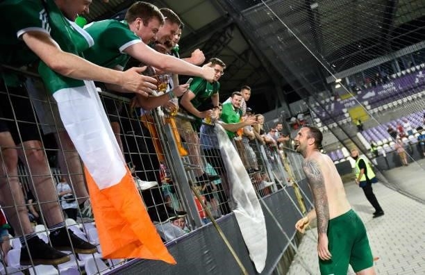 Budapest , Hungary - 8 June 2021; Shane Duffy of Republic of Ireland with Republic of Ireland supporters following the international friendly match...