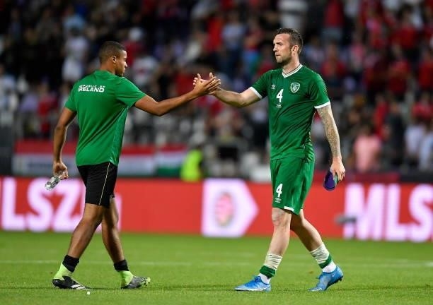 Budapest , Hungary - 8 June 2021; Republic of Ireland goalkeeper Gavin Bazunu, left, and Shane Duffy following the international friendly match...