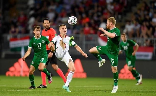 Budapest , Hungary - 8 June 2021; András Schafer of Hungary in action against Daryl Horgan of Republic of Ireland during the international friendly...