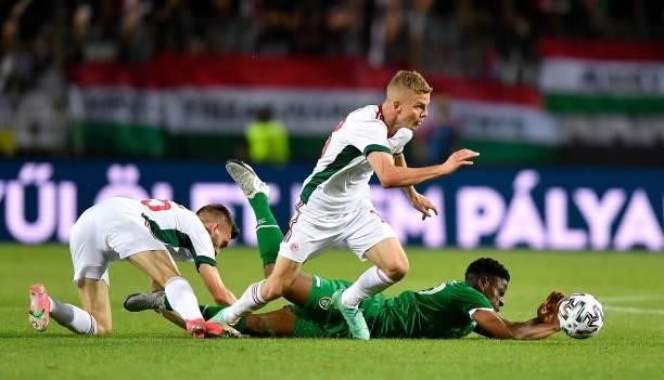 Budapest , Hungary - 8 June 2021; Chiedozie Ogbene of Republic of Ireland in action against András Schafer and Janos Hahn, left, of Hungary during...