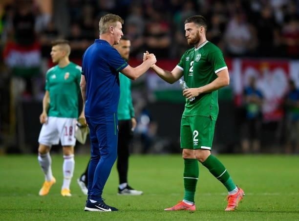 Budapest , Hungary - 8 June 2021; Republic of Ireland manager Stephen Kenny with Matt Doherty following the international friendly match between...