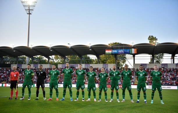 Budapest , Hungary - 8 June 2021; Republic of Ireland players stand for the playing of the National Anthem before the international friendly match...