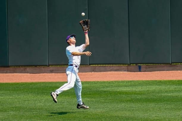 Avery Lehman of St. Thomas catches a fly ball against Salisbury during the Division III Men's Baseball Championship held at Perfect Game Field at...