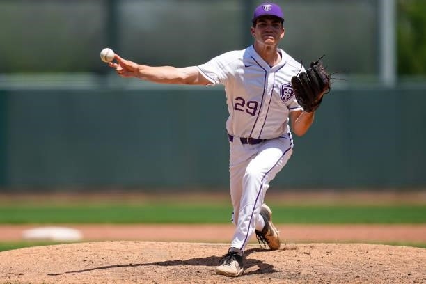 Constertina of St. Thomas throws to the plate against Salisbury during the Division III Men's Baseball Championship held at Perfect Game Field at...