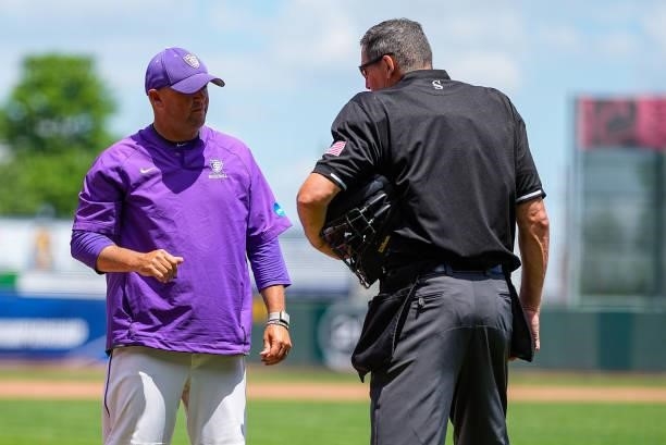 Head coach Chris Olean of St. Thomas argues a call with the umpire during the Division III Men's Baseball Championship against Salisbury held at...