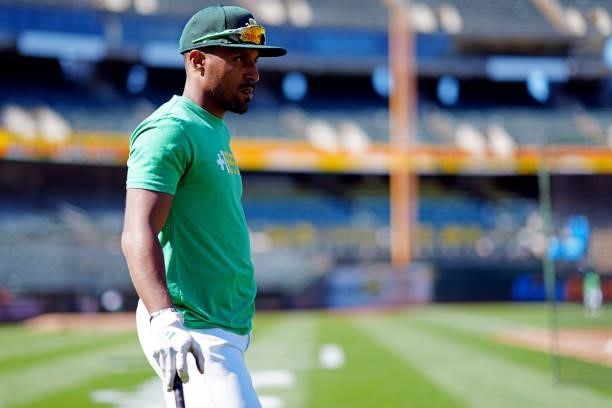 Tony Kemp of the Oakland Athletics looks on during batting practice prior to the game between the Arizona Diamondbacks and the Oakland Athletics at...