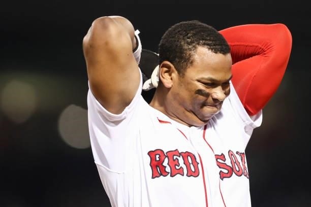 Rafael Devers of the Boston Red Sox reacts after grounding out in the sixth inning of a game against the Houston Astros at Fenway Park on June 8,...