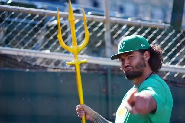 Sean Manaea of the Oakland Athletics walks with a trident during batting practice prior to the game between the Arizona Diamondbacks and the Oakland...