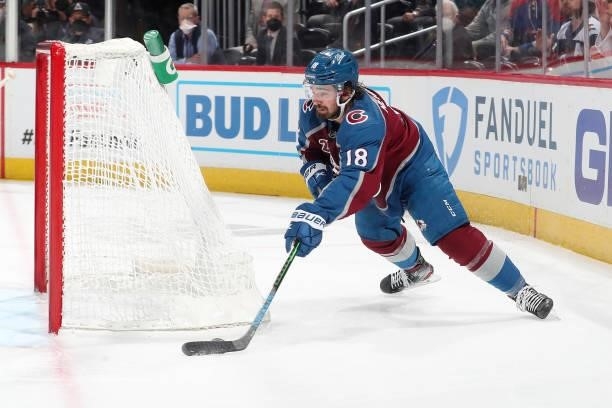 Alex Newhook of the Colorado Avalanche attempts to wrap the puck around the net against the Vegas Golden Knights in Game Five of the Second Round of...
