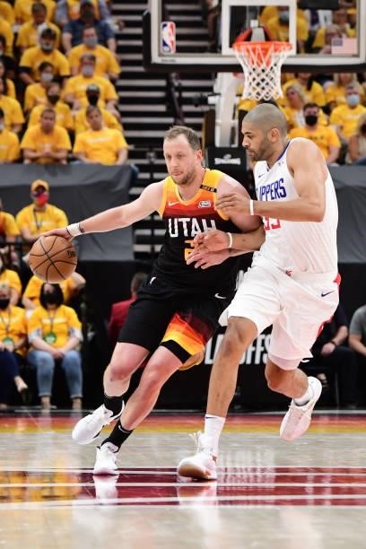 Nicolas Batum of the LA Clippers plays defense on Joe Ingles of the Utah Jazz during Round 2, Game 1 of the 2021 NBA Playoffs on June 8, 2021 at...