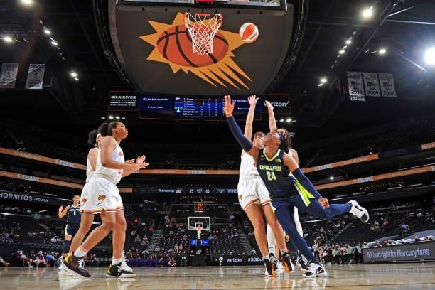 Arike Ogunbowale of the Dallas Wings shoots the ball against the Phoenix Mercury on June 8, 2021 at Phoenix Suns Arena in Phoenix, Arizona. NOTE TO...
