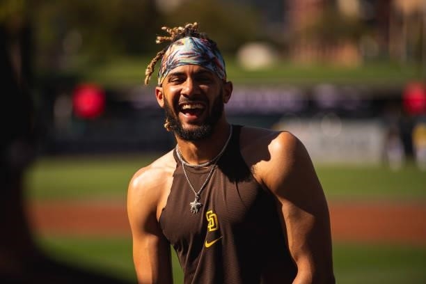 Fernando Tatis Jr of the San Diego Padres laughs during batting practice before facing the Chicago Cubs at Petco Park on June 8, 2021 in San Diego,...