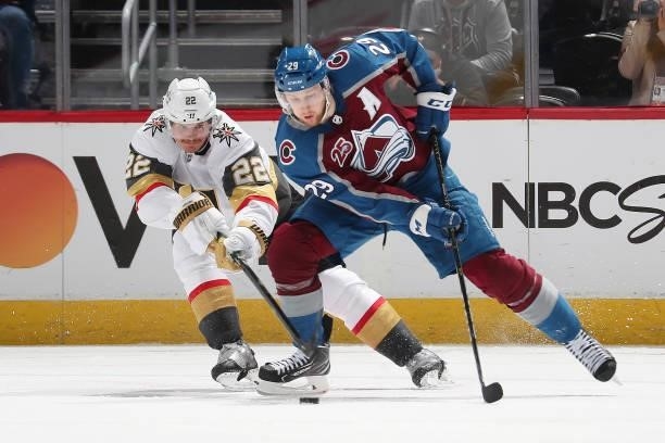 Nathan MacKinnon of the Colorado Avalanche skates against Nick Holden of the Vegas Golden Knights in Game Five of the Second Round of the 2021...