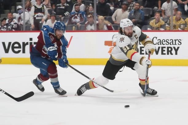 Devon Toews of the Colorado Avalanche defends against Mark Stone of the Vegas Golden Knights in Game Five of the Second Round of the 2021 Stanley Cup...