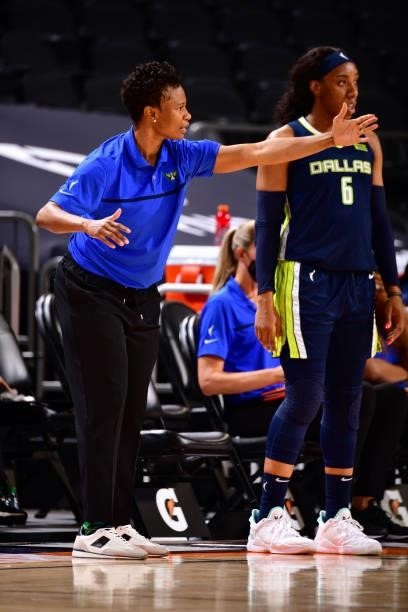 Vickie Johnson head coach of the Dallas Wings calls play during the game against the Phoenix Mercury on June 8, 2021 at Phoenix Suns Arena in...