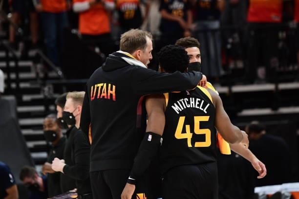 Joe Ingles of the Utah Jazz hugs Donovan Mitchell during Round 2, Game 1 of the 2021 NBA Playoffs on June 8, 2021 at vivint.SmartHome Arena in Salt...